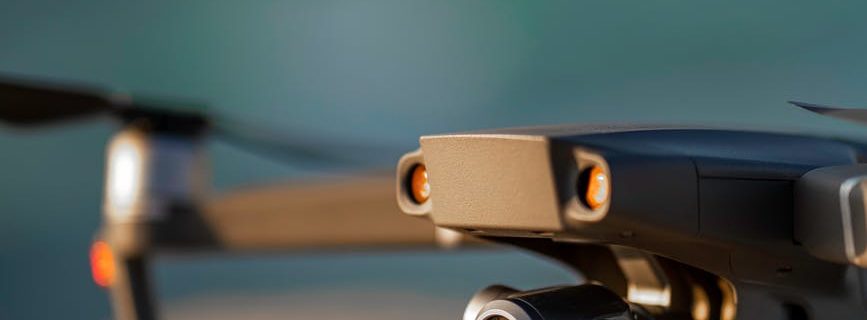 modern drone recording video on rough stone