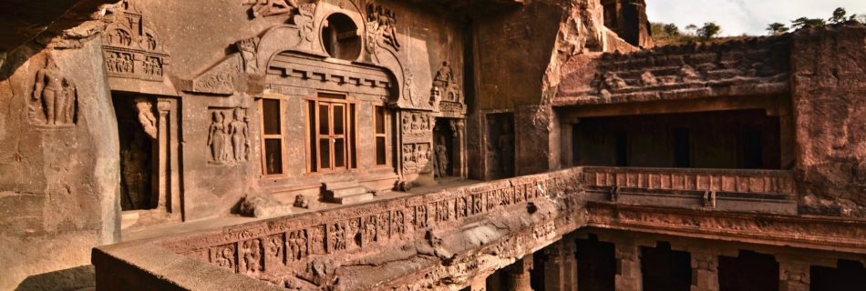 gray concrete building under cloudy sky